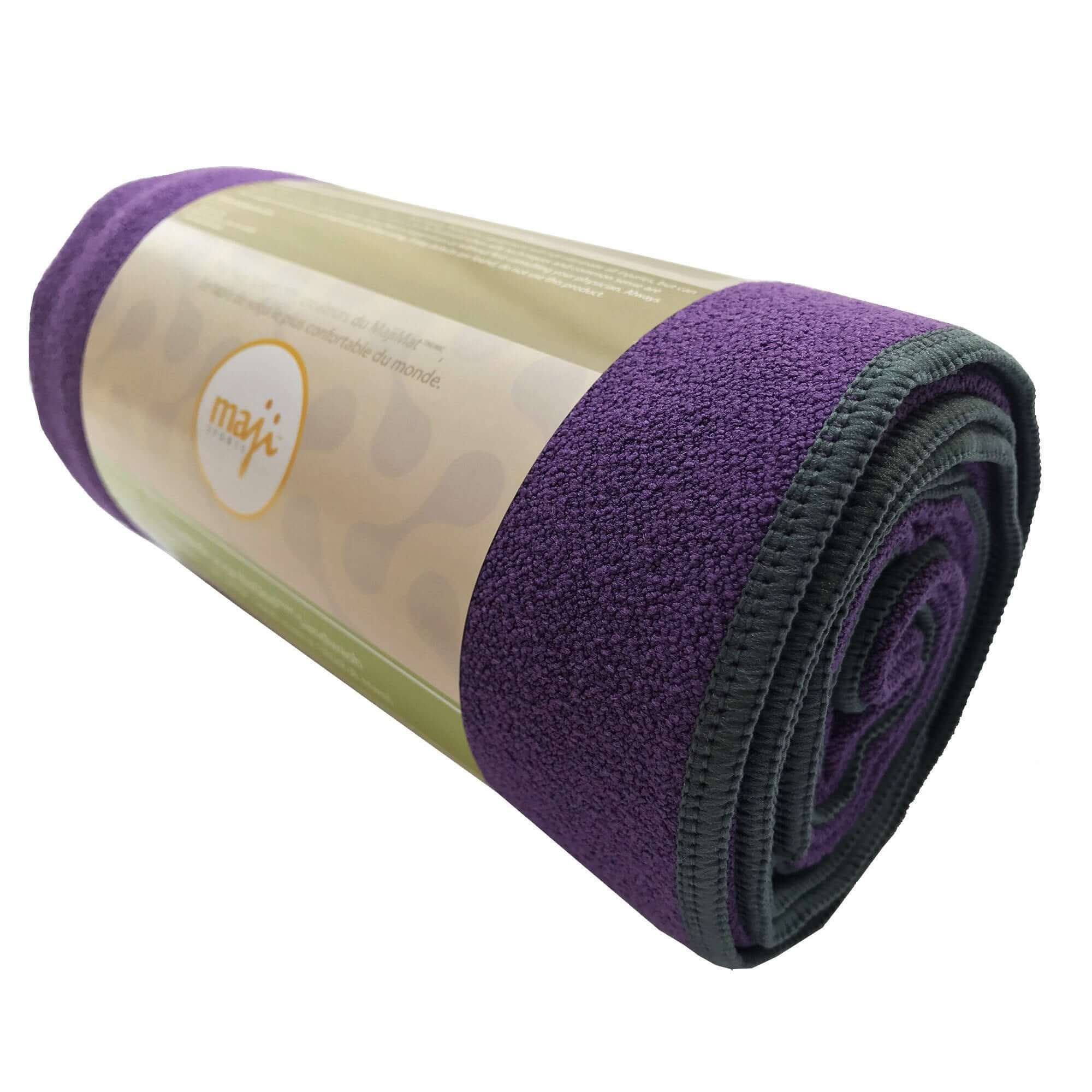 NoSkid Sand-Washed Yoga Mat Towel in various colors, showcasing its soft suede-like texture and slip-resistant surface.